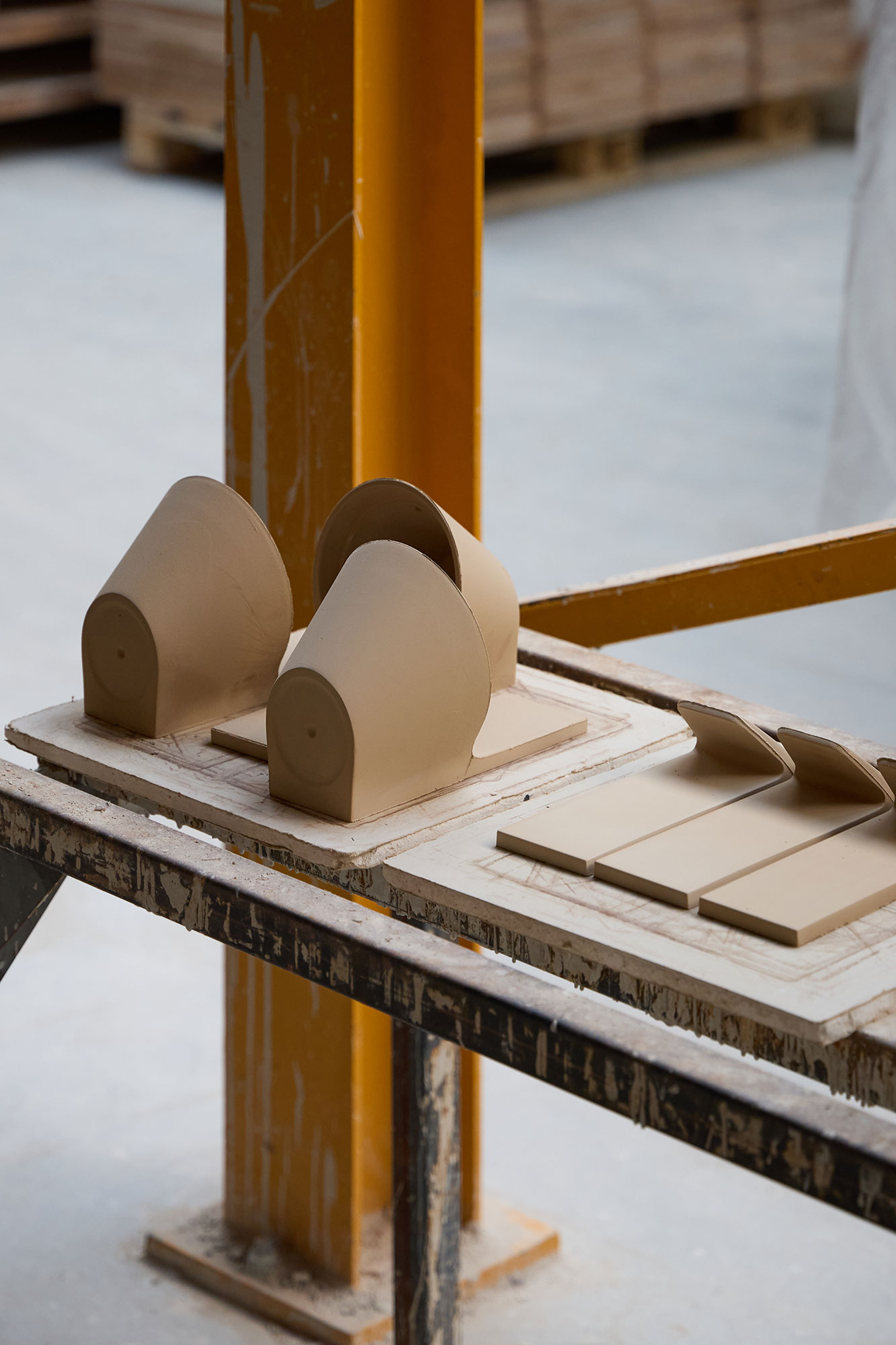 Molded hooks and lamps drying in the ceramic workshop